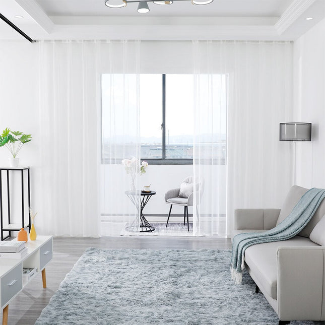 Gennemsigtigt gardin med naturligt hørlook