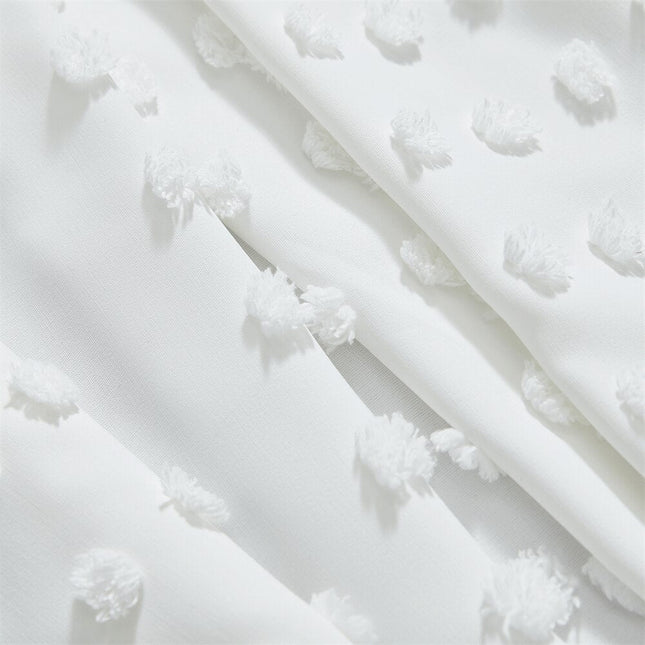 Hvidt let gardin med prikket tekstur