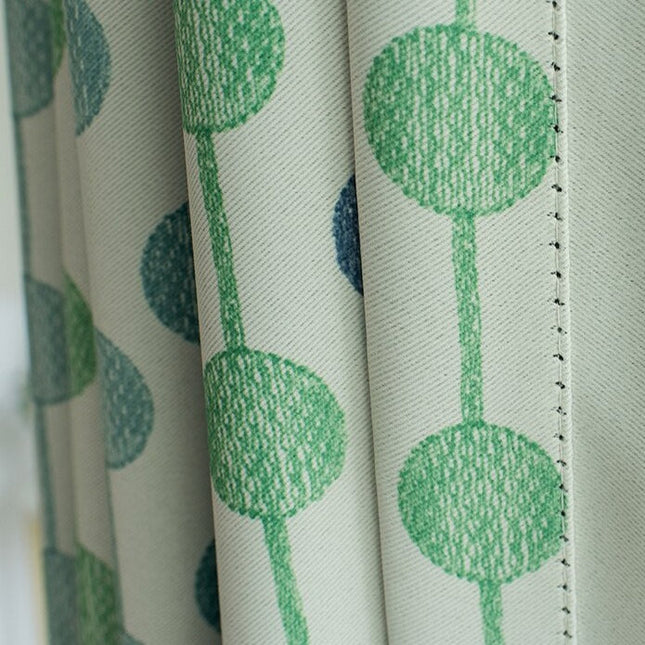 Grønt mønstret gardin til stuen