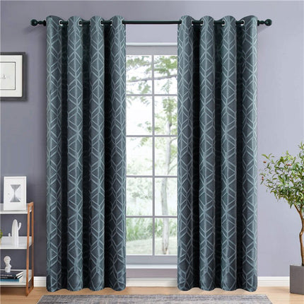Mørkegrønt mørklægningsgardin med geometrisk mønster
