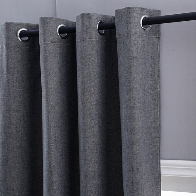 Antracitgråt mørklægningsgardin med struktur