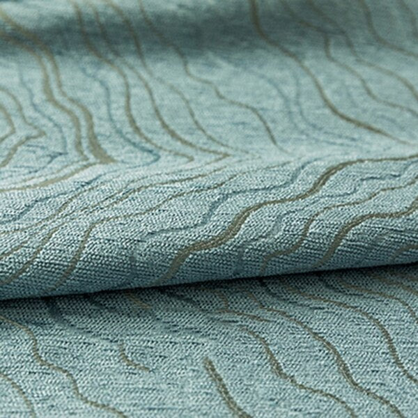 Blåt mørklægningsgardin med bølgemønster