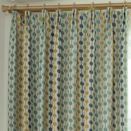 Grønt mønstret gardin til stuen