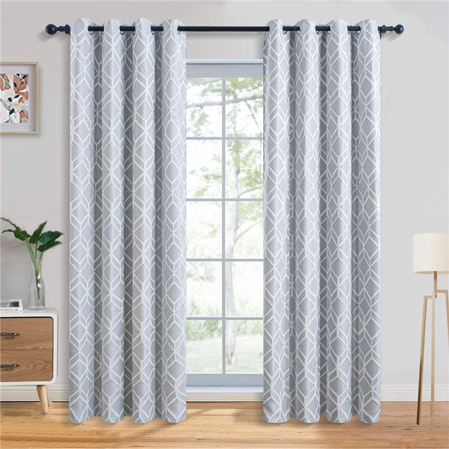 Lysegråt mørklægningsgardin med geometrisk mønster