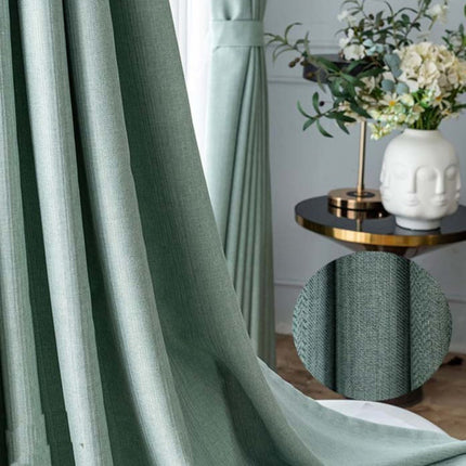 Mintgrønt mørklægningsgardin med fin struktur
