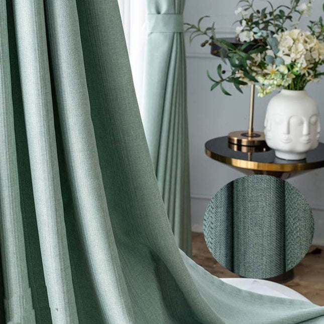 Mintgrønt mørklægningsgardin med fin struktur