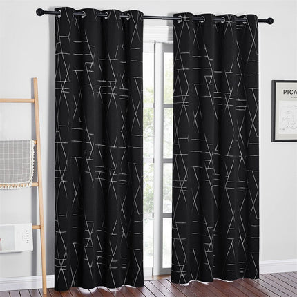 Sort mørklægningsgardin med sølv mønster