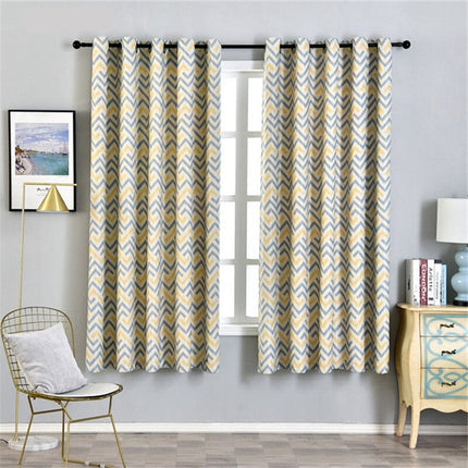 Gardin med gult og gråt chevronmønster