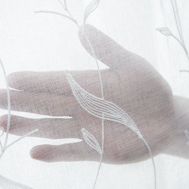 Tyndt gardin i hørlook med blade