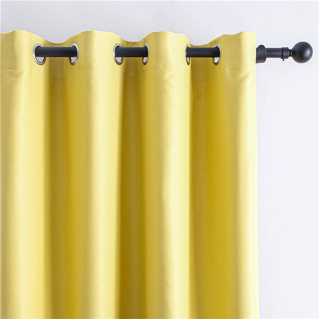 Ensfarvet gult mørklægningsgardin til stuen