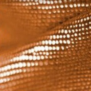 Orange mørklægningsgardin med struktur