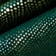 Mørklægningsgardin i petroleum med prikmønster