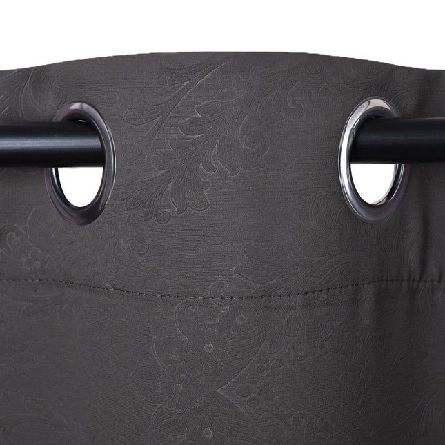 Beige mørklægningsgardin med præget mønster