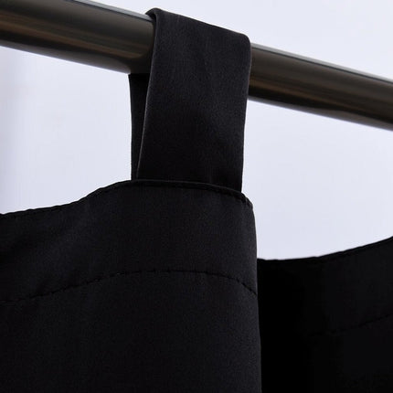 Lyst mørklægningsgardin med brede stropper