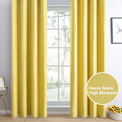 Ensfarvet gult mørklægningsgardin til stuen
