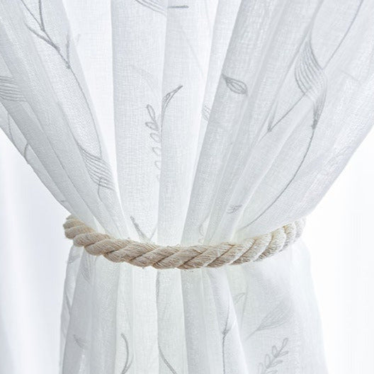 Tyndt gardin i hørlook med blade