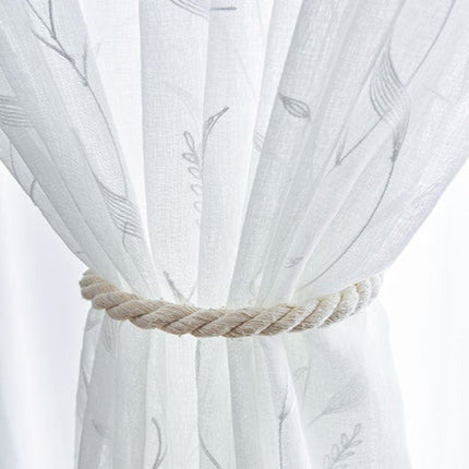 Tyndt gardin i hørlook med blade