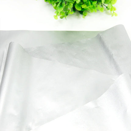 Sort mørklægningsstof med sølvbelægning