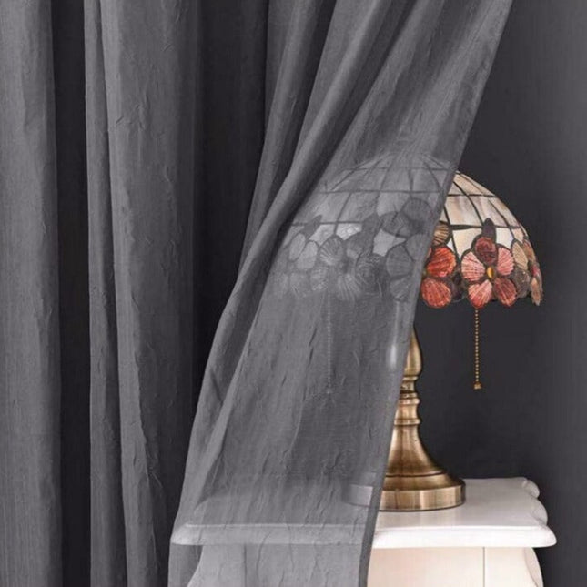 Dobbelt mørklægningsgardin med transparent lag