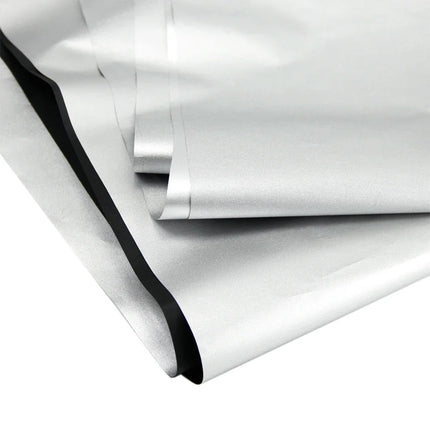 Sort mørklægningsstof med sølvbelægning