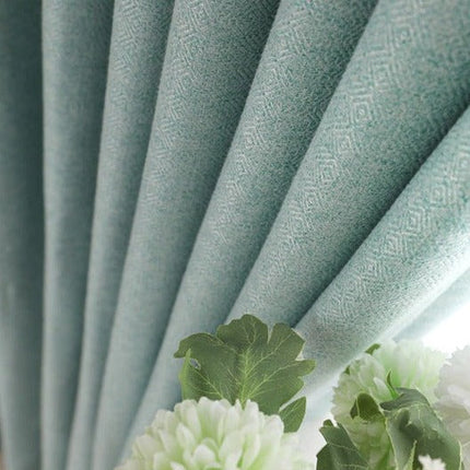 Turkis lysfiltrerende gardin til stue