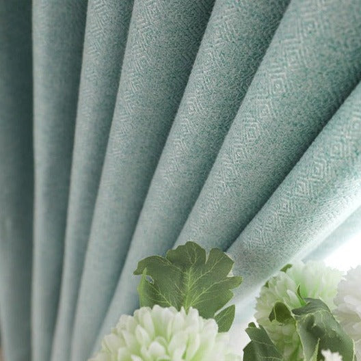 Turkis lysfiltrerende gardin til stue