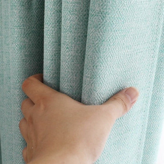 Turkis lysfiltrerende gardin til stue