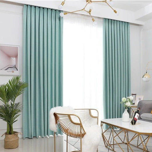 Turkis lysfiltrerende gardin til stue