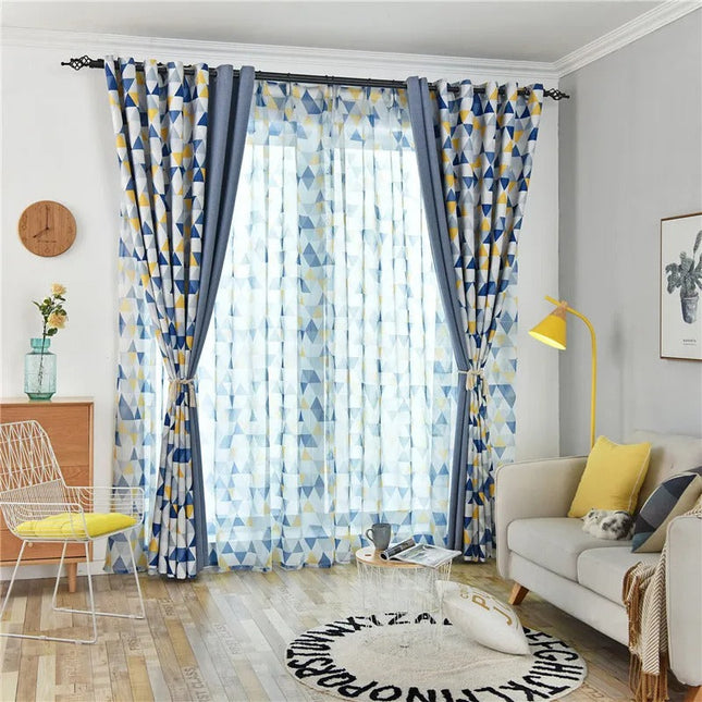 Mørklægningsgardin med blåt geometrisk mønster