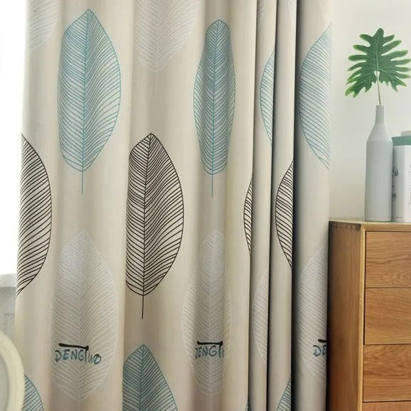 Mørklægningsgardin med moderne print af blade