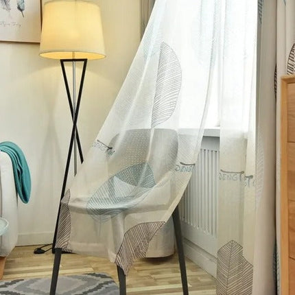 Mørklægningsgardin med moderne print af blade