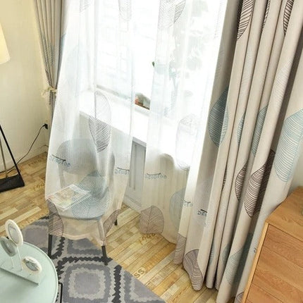 Mørklægningsgardin med moderne print af blade