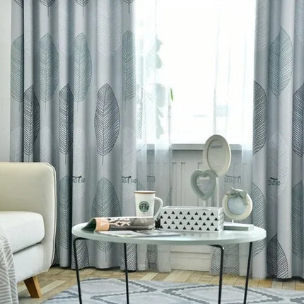 Let gardin med moderne bladmotiv