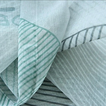 Let gardin med moderne bladmotiv