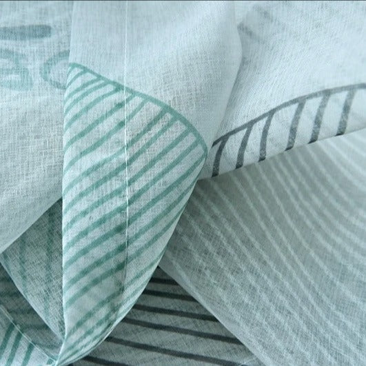 Let gardin med moderne bladmotiv