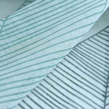 Let gardin med moderne bladmotiv