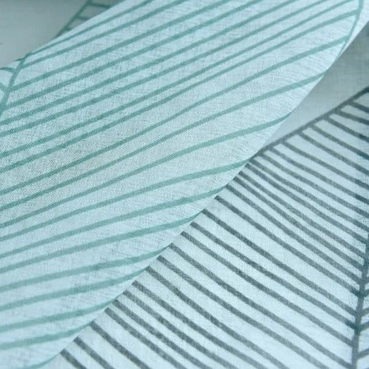 Let gardin med moderne bladmotiv