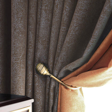 Mørklægningsgardin i taupe og terracotta