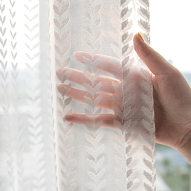 Hvidt gardin med sildebensmønster