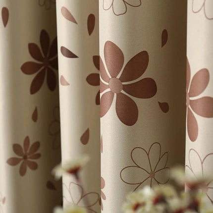 Mørklægningsgardin med simpelt blomstermønster