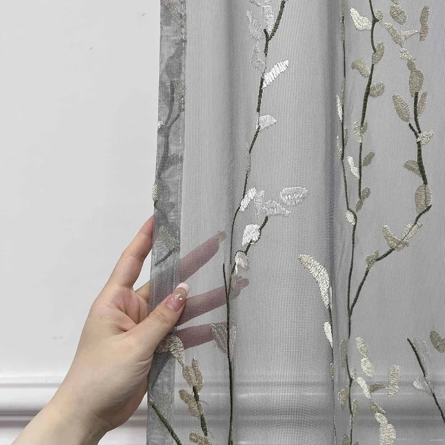 Let gardin med broderede grene