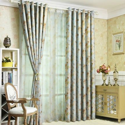 Mørklægningsgardin med romantisk blomstermotiv