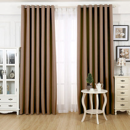 Mørklægningsgardin i varm kaffecreme farve
