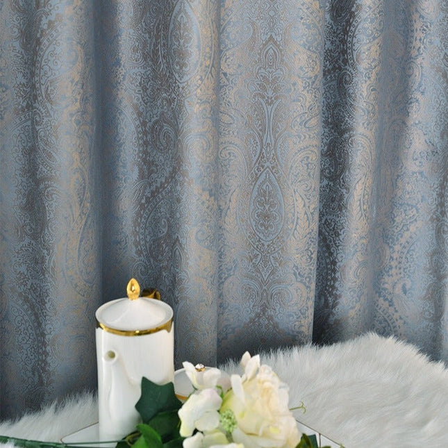 Hino mørklægningsgardin med paisley mønster