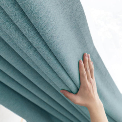 Blåt mørklægningsgardin med naturligt hørlook