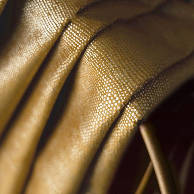 Gult mørklægningsgardin med prikket mønster