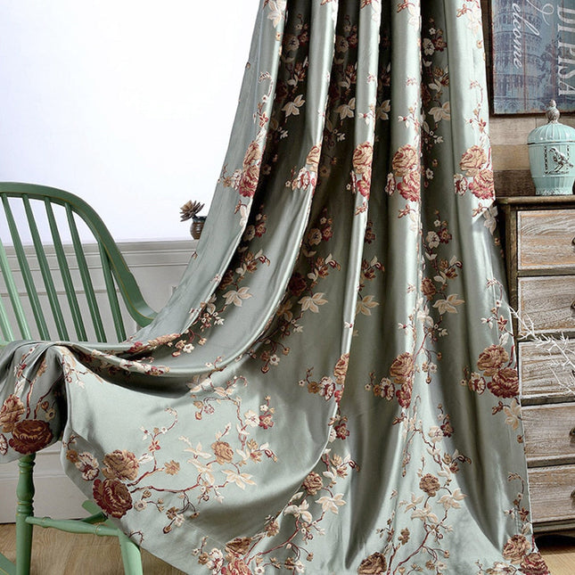 Elegant mørklægningsgardin med blomstermotiv