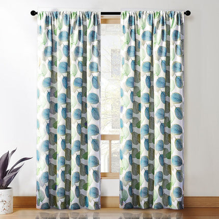 Grønt mønstret mørklægningsgardin med blade