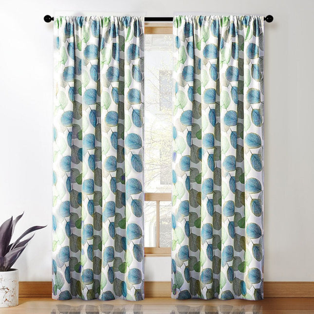Grønt mønstret mørklægningsgardin med blade