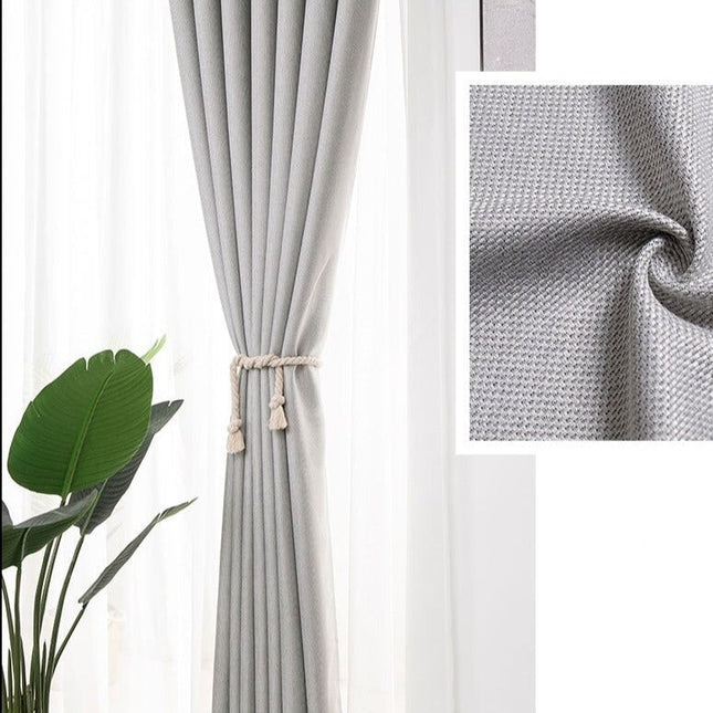 Gråt gardin med flot tekstur